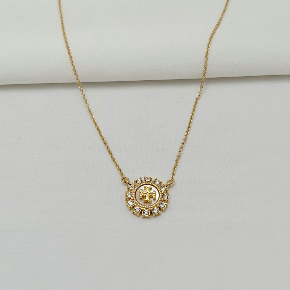 Tory Burch Gold Pendant Necklace with Crystal Accents